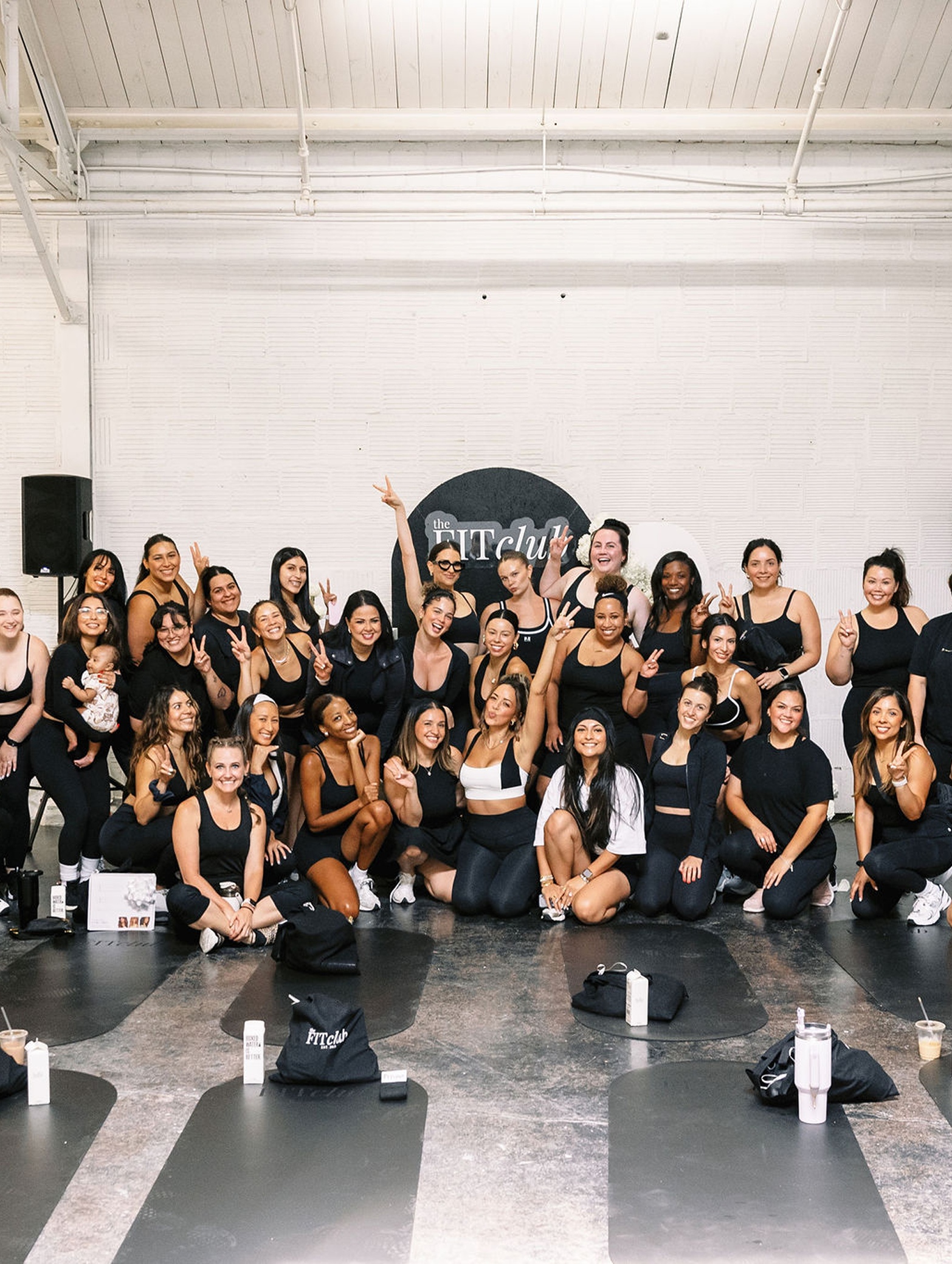 Women of all shapes, sizes and stories gathered together at a FITclub event to strengthen and better one another.