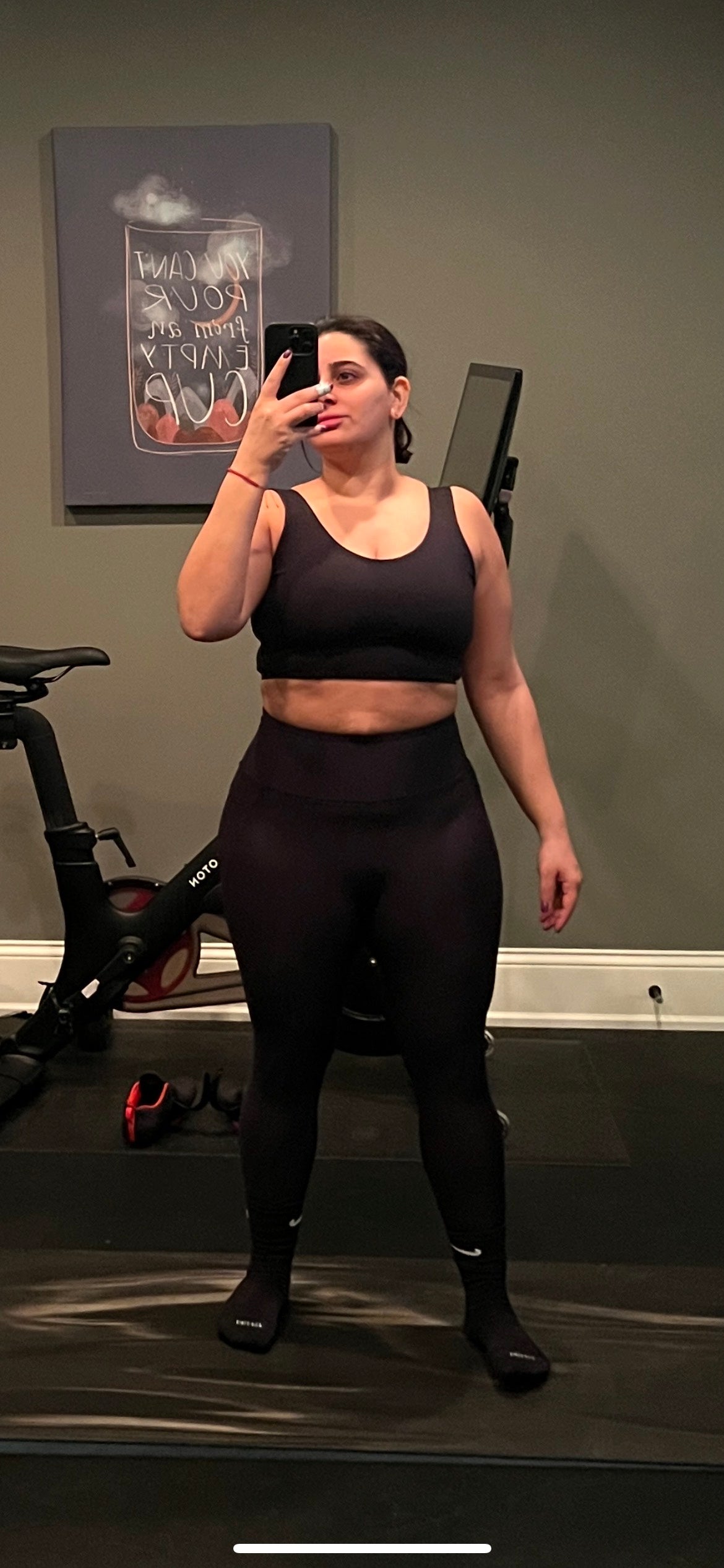 A woman who lost 20 pounds after joining the online fitness community The FITclub